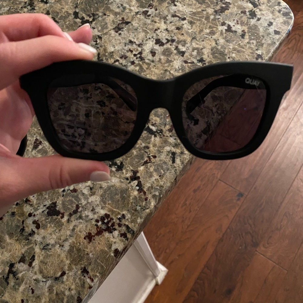 QUAY sunglasses.